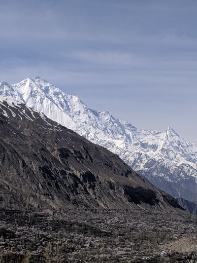 Brown and white mountains
